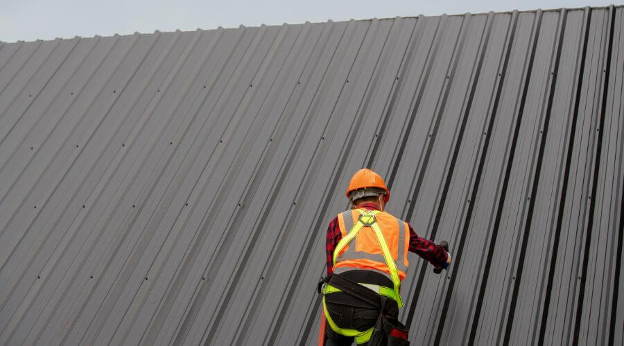 Professional metal roof installation services in Clermont, IA